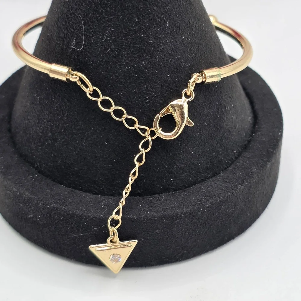 Guess Gold Tone Heart Locket Rose Charm Bangle Bracelet Adjustable Logo Tag